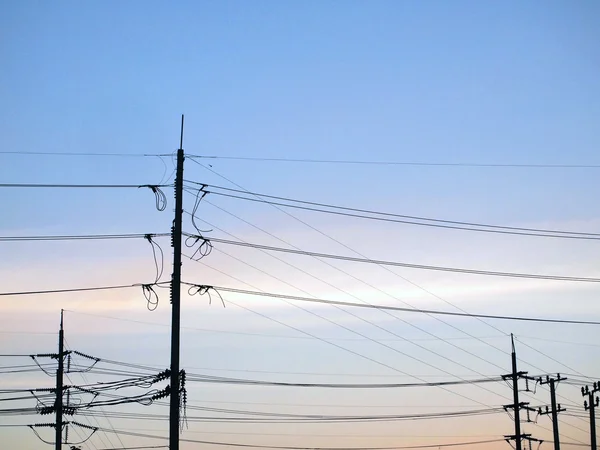 Electricity poles on colorful sky , sunset — Stock Photo, Image