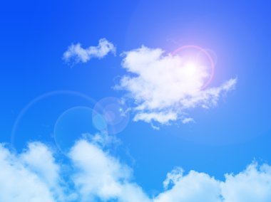 Bulutlu ve güneşli mavi gökyüzü.