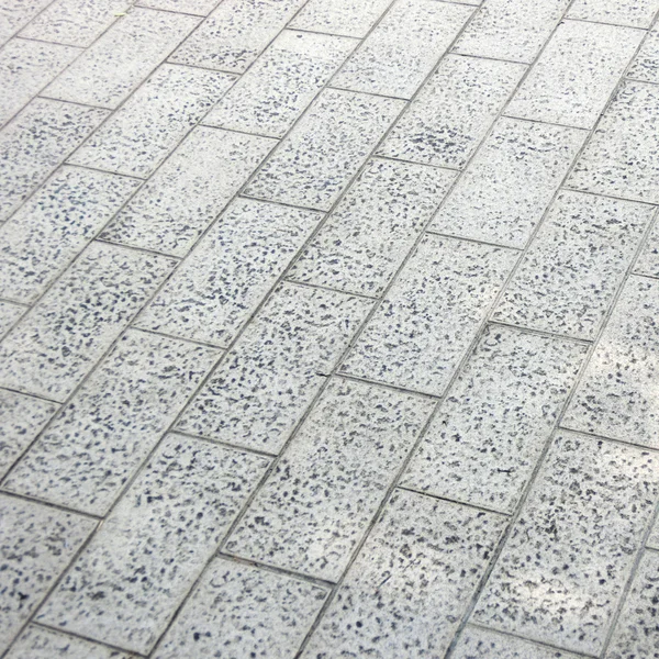 Döşeme arka planı gri Arnavut kaldırımı taşları — Stok fotoğraf
