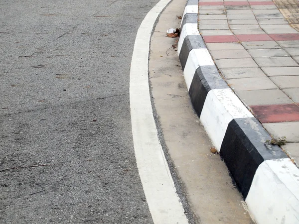 Closeup of road with black and white line — Stock Photo, Image