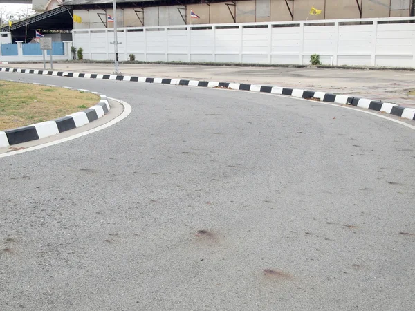 Closeup of road with black and white line — Stock Photo, Image