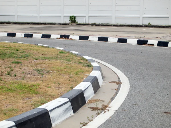 Closeup of road with black and white line — Stock Photo, Image