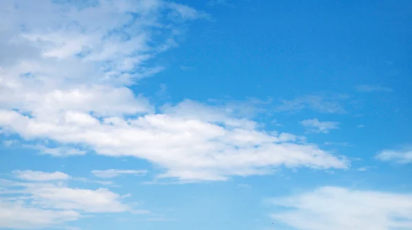 Blue sky with clouds and sun Royalty Free Stock Images