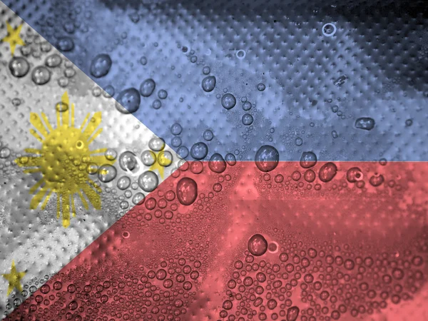 Капли воды на фоне флага Филиппин — стоковое фото