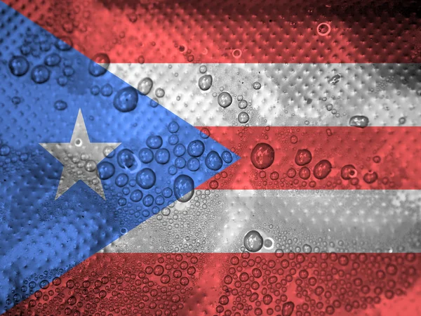 Gouttes d'eau sur fond drapeau Porto Rico — Photo