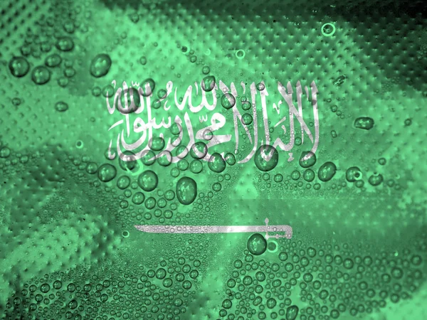 Σταγόνες νερού σε φόντο σημαία Σαουδικής Αραβίας — Φωτογραφία Αρχείου