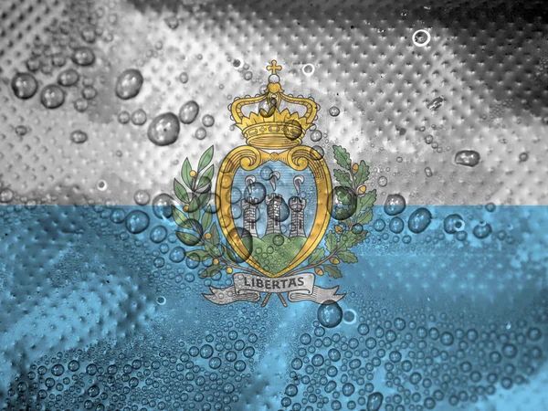 Gotas de agua sobre fondo de bandera de San Marino — Foto de Stock