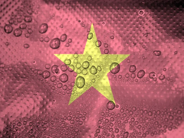 Tetes air di latar belakang bendera Vietnam — Stok Foto