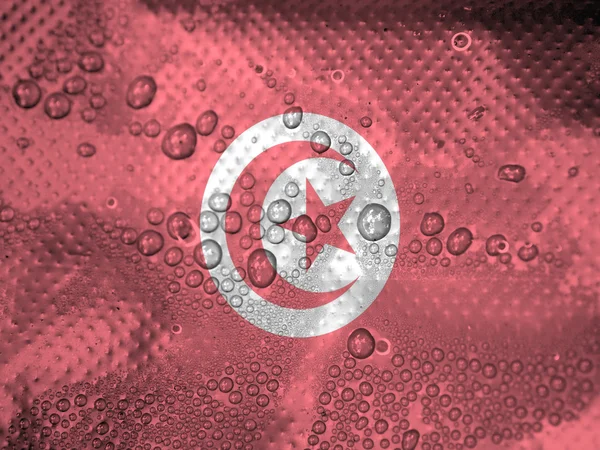 Water drops on Tunisia flag background — Stock Photo, Image