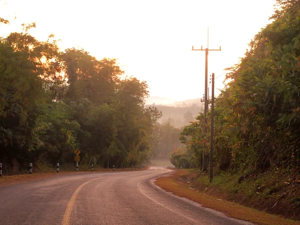 Autumn sunrise road close up — Stock Photo, Image