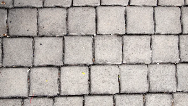 灰色の敷石の石の舗装の背景 — ストック写真