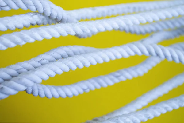 White Rope Yellow Background Rope Close Rope Sections Taut — Stock Photo, Image