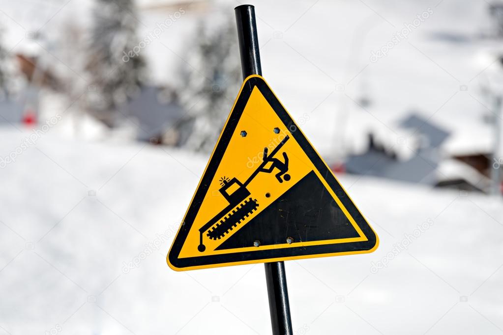 Danger! Snowcat sign on a Ski Area
