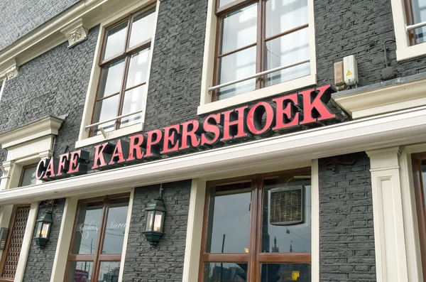 Logo v kavárně Karpershoek. — Stock fotografie