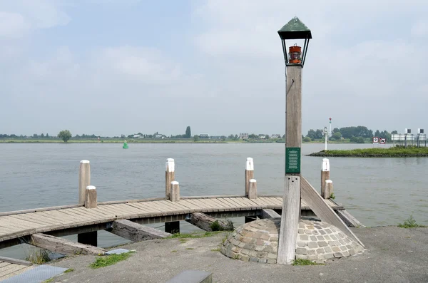 Light Beacon on the jetty in the river The Waal. — Stock Photo, Image