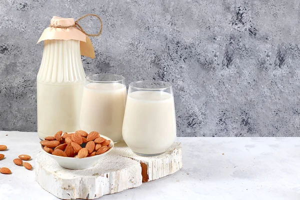 Almond vegan alternative milk lactose and gluten free, no allergies, healthy eating concept, maintaining healthy intestinal microflora, diet food, weight loss,