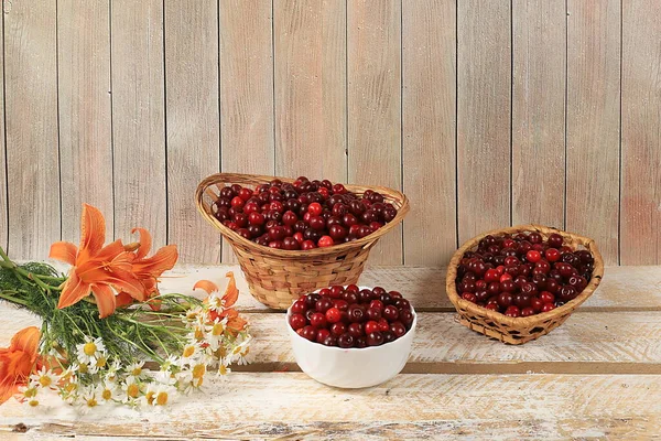 Summer cherry berries on wooden background, rustic style, healthy natural food concept, harvest in august, store advertisement, business card for cafe, invitation with place for text, selective focus