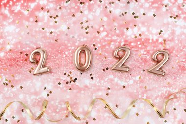 2021 Noel arkaplanı ve yeni yıl konsepti. Bokeh ve bulanık, soyut ışık arkaplanı. Metnin, arkaplan resmin ya da fotoğraf düzenleyici tabakası için kış afişi, odak dışı