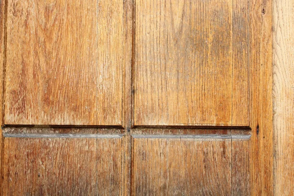 Старая деревянная доска на старинной двери — стоковое фото