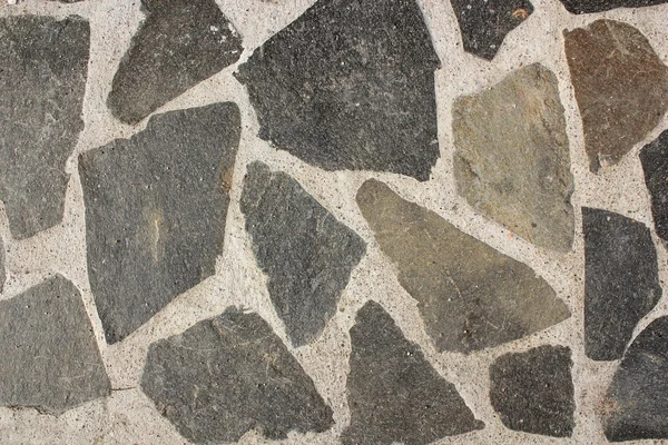 Pedras na textura do cimento — Fotografia de Stock
