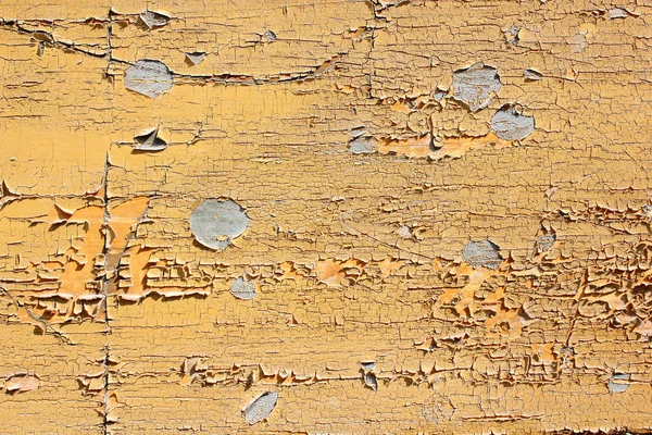 Grungy gelbe Farbe auf Holz — Stockfoto