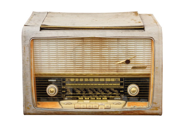 Old weathered wooden radio isolated over white background