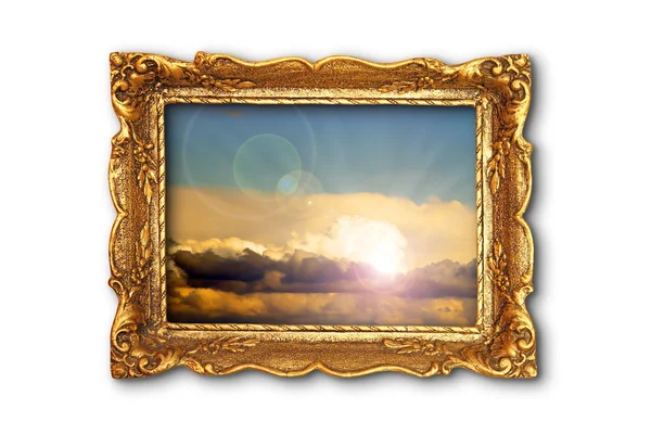 Colorful sky image in ancient gilded painting frame — Stock Photo, Image