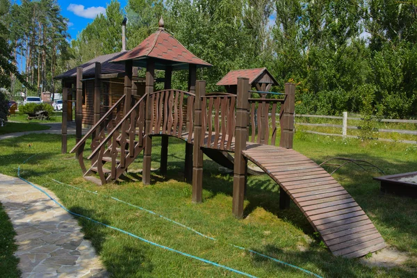 Children's slide in the yard of a private house — Stock Photo, Image