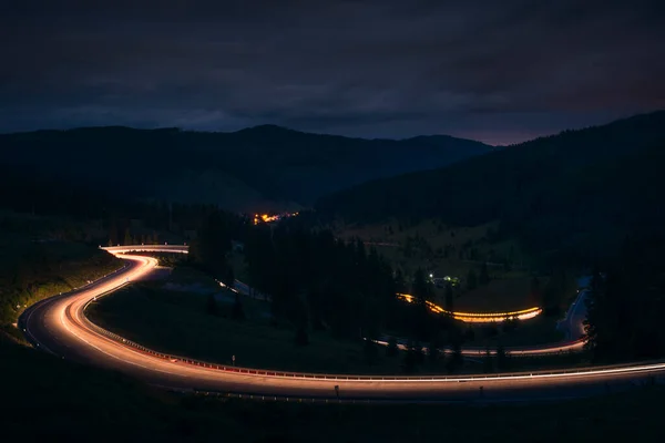 Car Light Trails Curvy Road Mountains Dramatic Sky — Stock Photo, Image