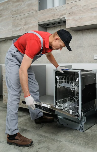 Dishwasher installation Stock Photos Royalty Free Dishwasher Dishwasher installation Stock Photos Royalty Free Dishwasher