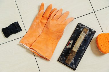 Tools for grouting on tile