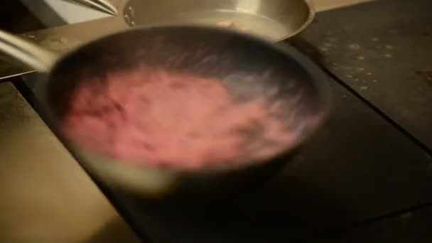 Beet quinoa cooking in a skillet — Stock Video