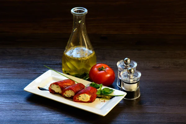 Marinated peppers, served on white dish — Stock Photo, Image