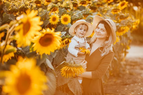 Young Beautiful Mother Her Little Cute Son Walking Field Sunflowers —  Fotos de Stock