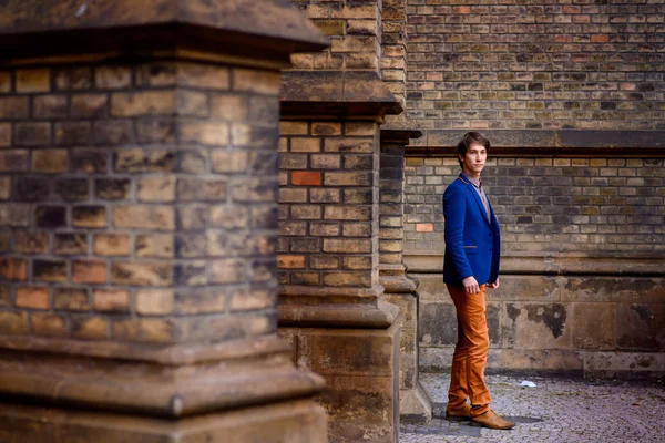 Portrait of young man, dressed in a blue jacket — Stock Photo, Image