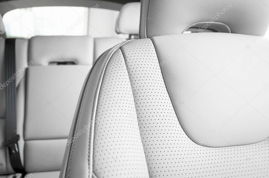 Modern sport car perforated red leather interior