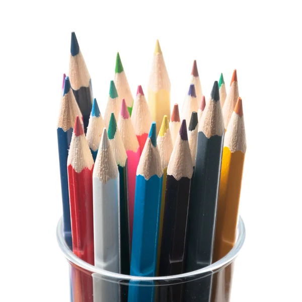 Multi colored pencils in glass jar — Stock Photo, Image