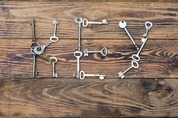 Keys on the background of wood. — Stock Photo, Image