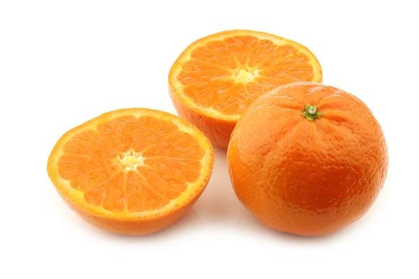 Fresh tangerine and a cut one — Stock Photo, Image