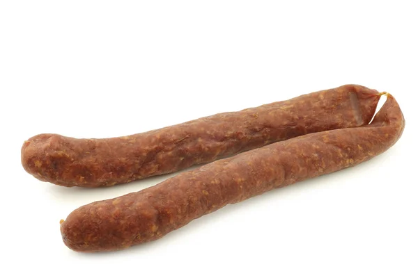 Traditional frisian smoked and dried sausages on a white background — Stock Photo, Image