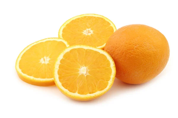 Fresh orange and some cut ones — Stock Photo, Image