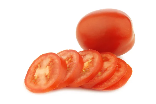 Fresh and colorful italian roma tomato and some cut slices — Stock Photo, Image