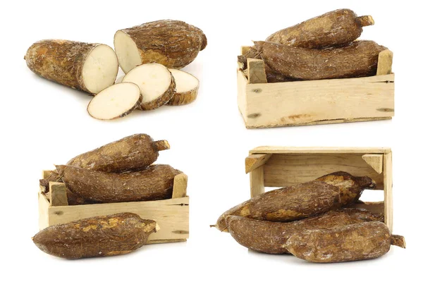 Bunch Cassava Roots Some Wooden Crate White Background — Stockfoto