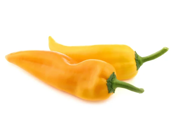 Two fresh yellow sweet peppers (capsicum) — Stock Photo, Image