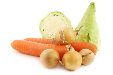 Kış havuç, kahverengi soğan ve kesilmiş bir sivri lahana