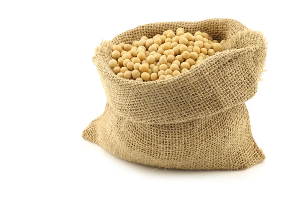 Soy beans in a burlap bag — Stock Photo, Image