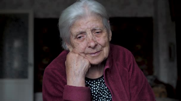 Portrait Of Elderly Old Caucasian Woman Sitting With Her Head Propped On Hand — Stock Video