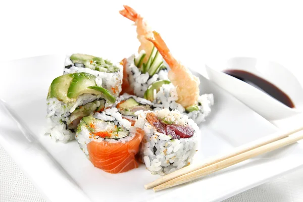 Sushi on a white plate, shallow focus — Stock Photo, Image