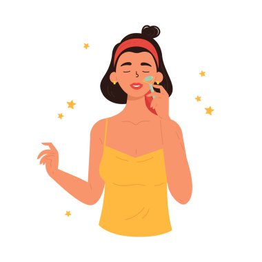 Yüz Gua Sha masajı. Yüzünde yeşim taşı olan kadın. 