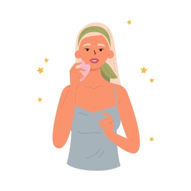 Yüz Gua Sha masajı. Gua sha taşlı kadın